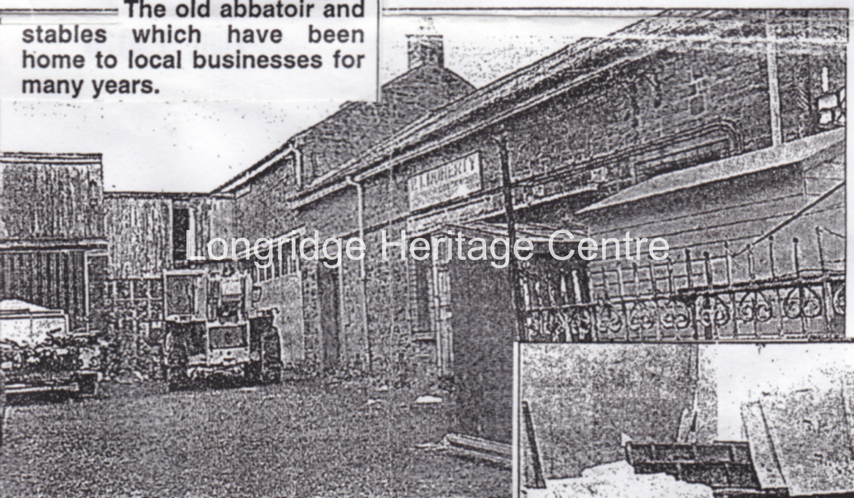 842C - Co-op building - Newspaper clipping of the rear of the main building. - Unknown